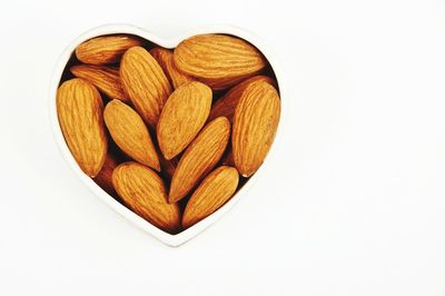 High angle view of heart shape against white background