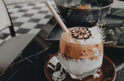 High angle view of coffee cup on table