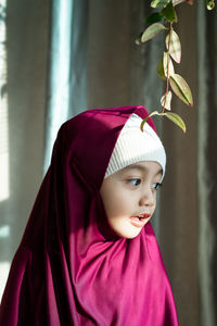 Portrait of a girl looking away