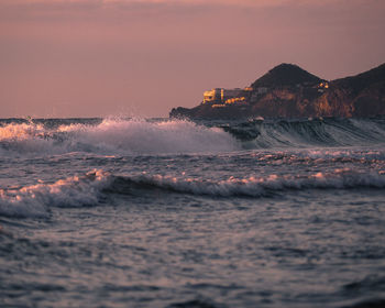 Scenic view of sea against sky during sunset