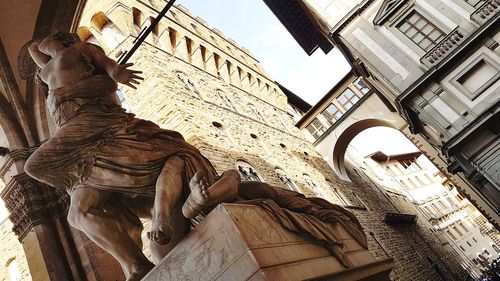 Low angle view of statue of historic building