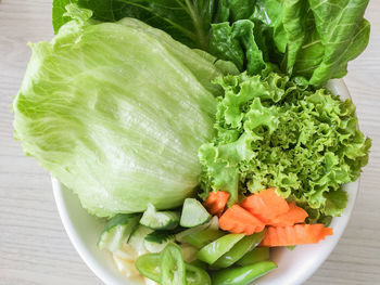 High angle view of chopped vegetables in bowl on table