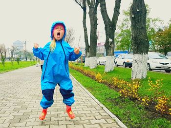 Portrait of boy playing in park