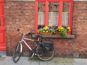 Bicycle against brick wall