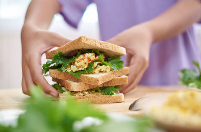 Midsection of man preparing food
