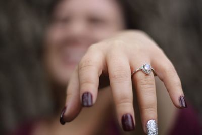 Close-up of woman wearing ring