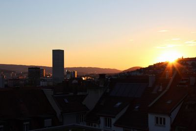 View of buildings against sky during sunset