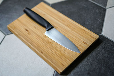 High angle view of cutting board on table