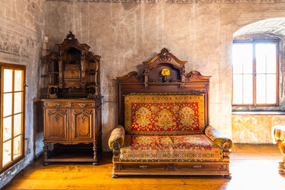 Vintage furniture in the medieval orava castle. oravsky podzamok, slovakia, 21 july 2022