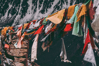 Close-up of clothes drying against wall