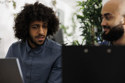 Young man using laptop