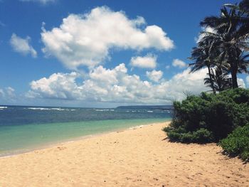 Scenic view of sea against cloudy sky