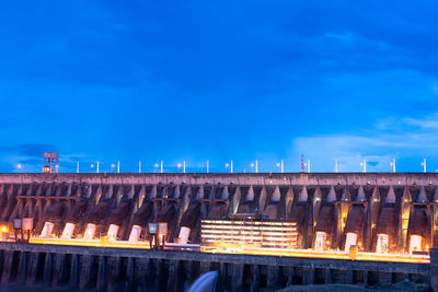 Close-up to the itaipu hydroelectric dam at night.