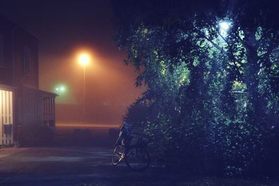 Illuminated street light at night