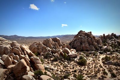 Scenic view of rocky mountains against sky