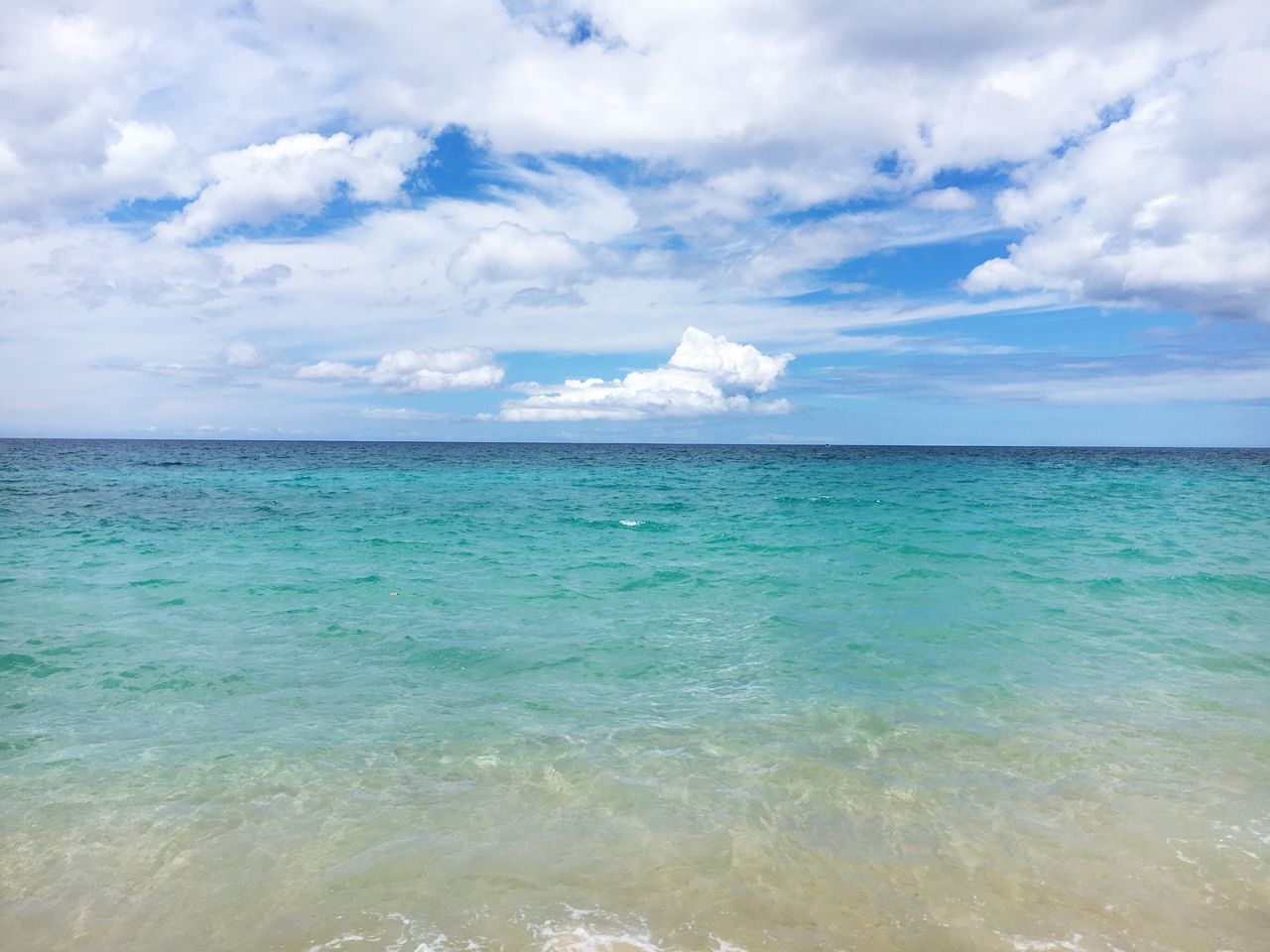 sea, water, horizon over water, sky, scenics, tranquil scene, beauty in nature, tranquility, cloud - sky, nature, cloudy, cloud, waterfront, beach, idyllic, seascape, rippled, wave, blue, day