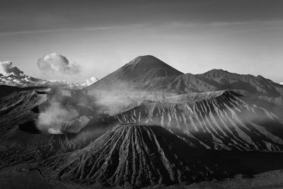 Scenic view of volcanic mountain against sky