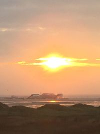 Scenic view of beach during sunset