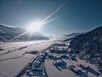 High angle view of snow covered mountain against sky