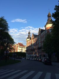 Buildings in city against sky