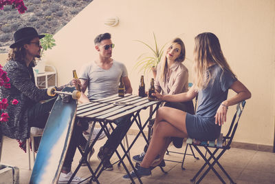 Young couple sitting on chair