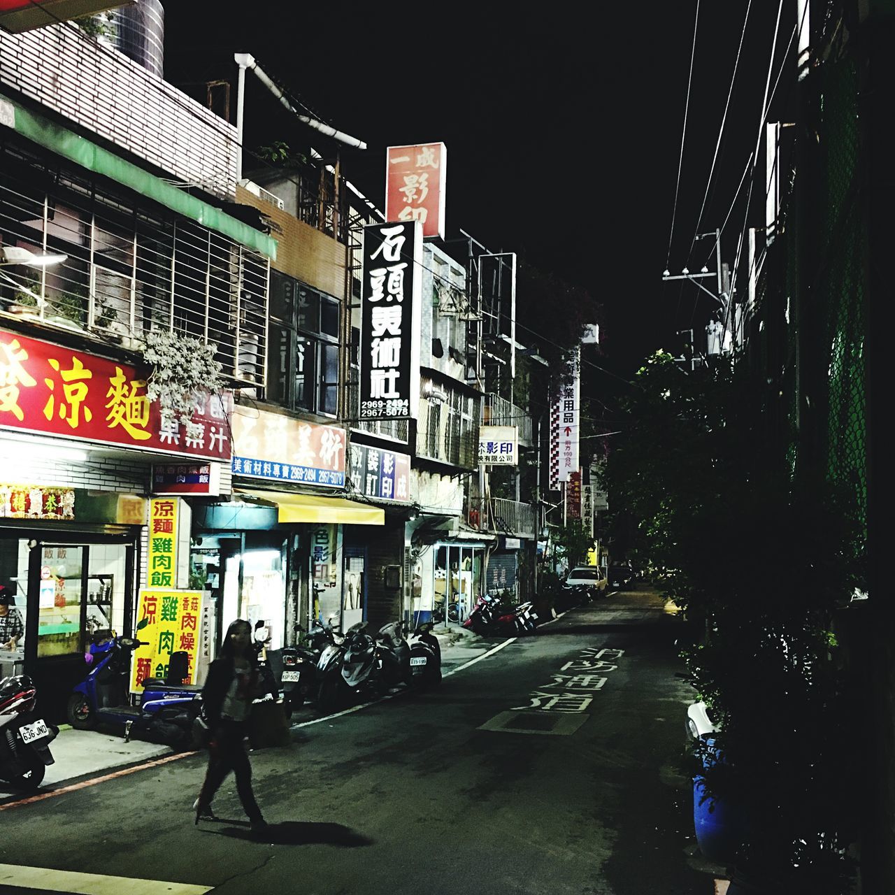 night, architecture, building exterior, illuminated, built structure, city, outdoors, men, real people, neon, sky, people