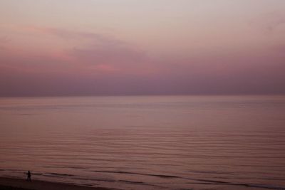 Scenic view of sea at sunset
