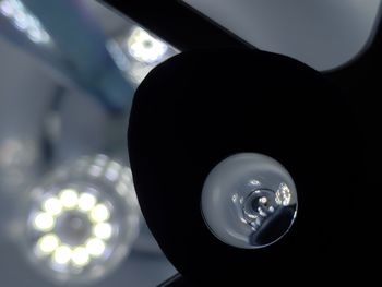 Low angle view of illuminated light bulb