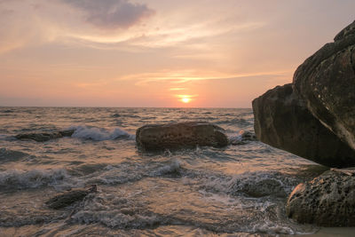 Scenic view of sea against sky during sunset