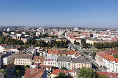 High angle view of townscape against clear blue sky