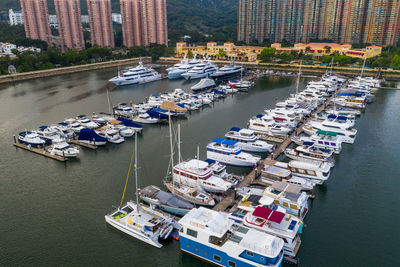 High angle view of boats moored at harbor