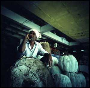 Full length portrait of man sitting