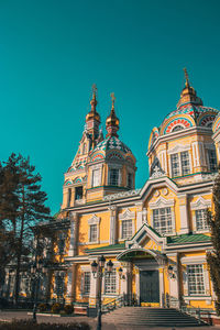 Low angle view of building against blue sky