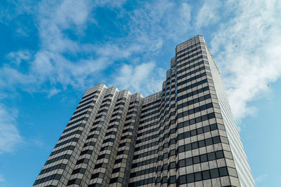 Low angle view of skyscraper against sky