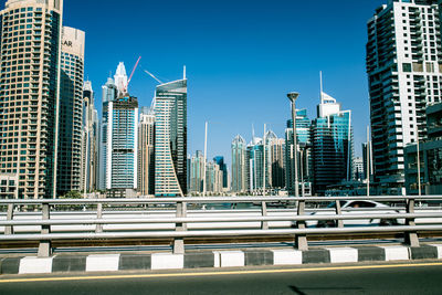 Modern cityscape against clear sky