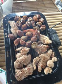 Close-up of meat on barbecue grill