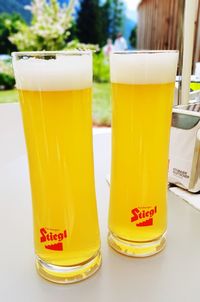 Close-up of beer glass on table