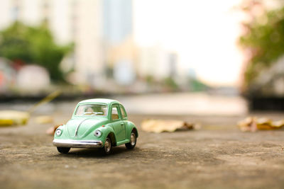 Close-up of toy car on road