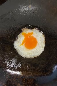 High angle view of egg in frying pan