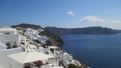 High angle view of town by sea