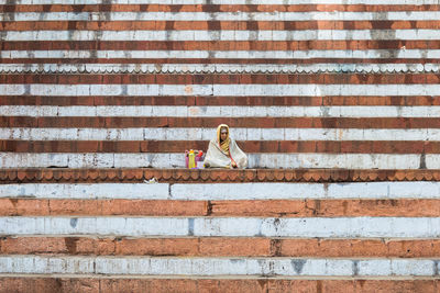 Man sitting on steps