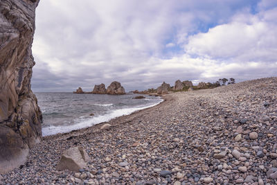 Scenic view of beach against sky