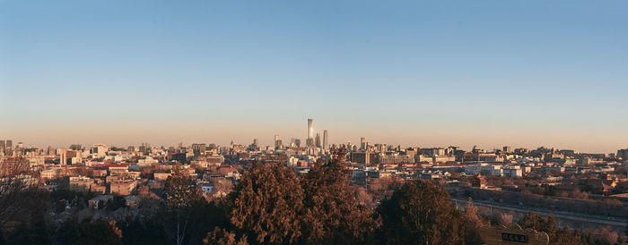 High angle view of buildings against sky during sunset