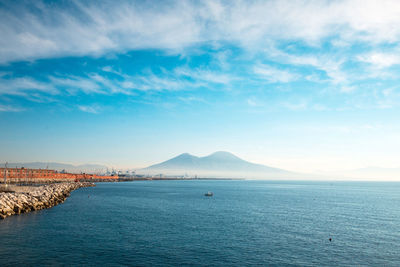 Scenic view of sea against cloudy sky