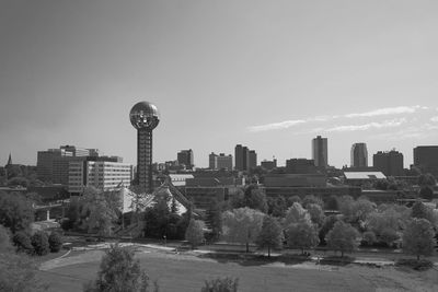 Buildings in city against sky