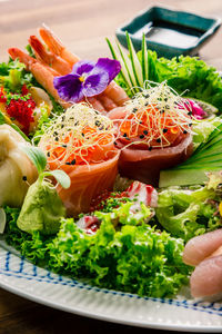 Close-up of chopped fruits and vegetables on table