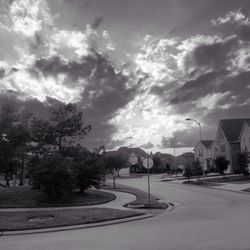 Road against cloudy sky