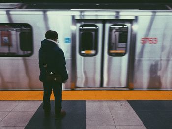 Rear view of train at railroad station platform