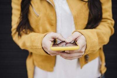 Close-up of woman holding hands