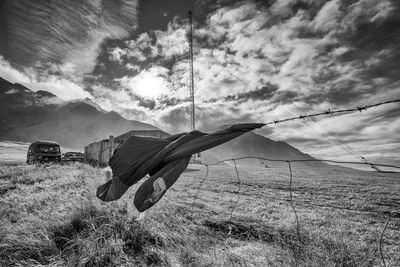 Tent on field against sky